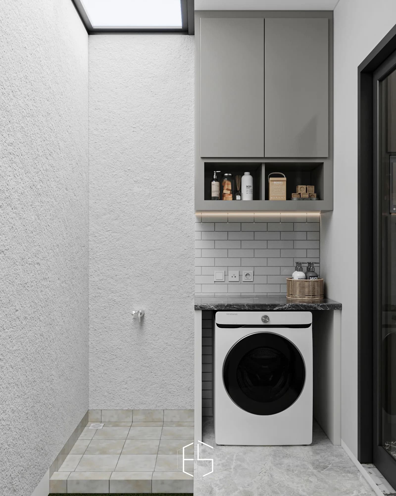 Quantis Signature: The laundry nook places a washing machine beneath a worktop, with open storage, overhead cabinetry and light from above.