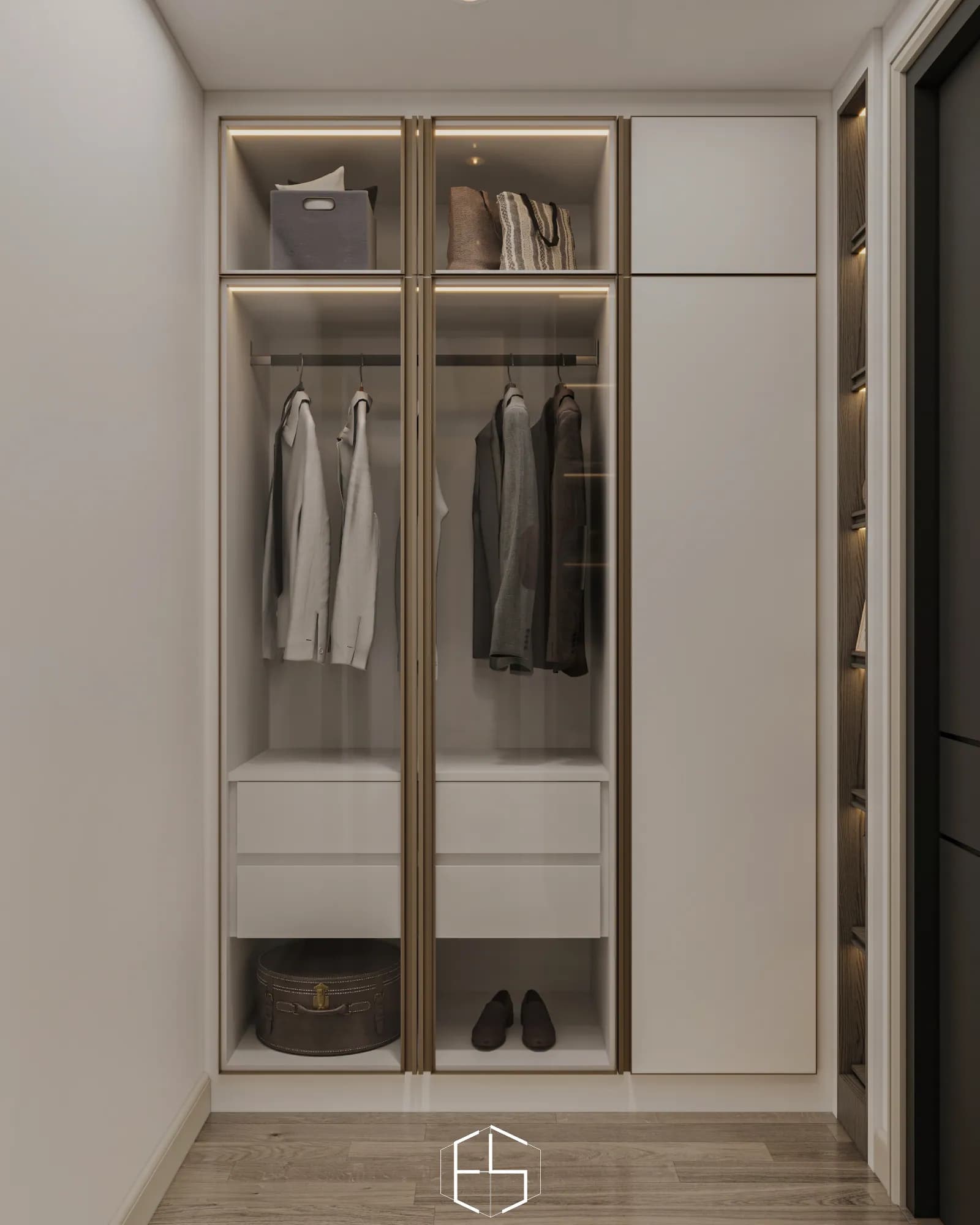 Quantis Signature: Glass wardrobe doors reveal hanging rails, drawers and upper storage, outlined by warm lighting and metallic-toned frames.