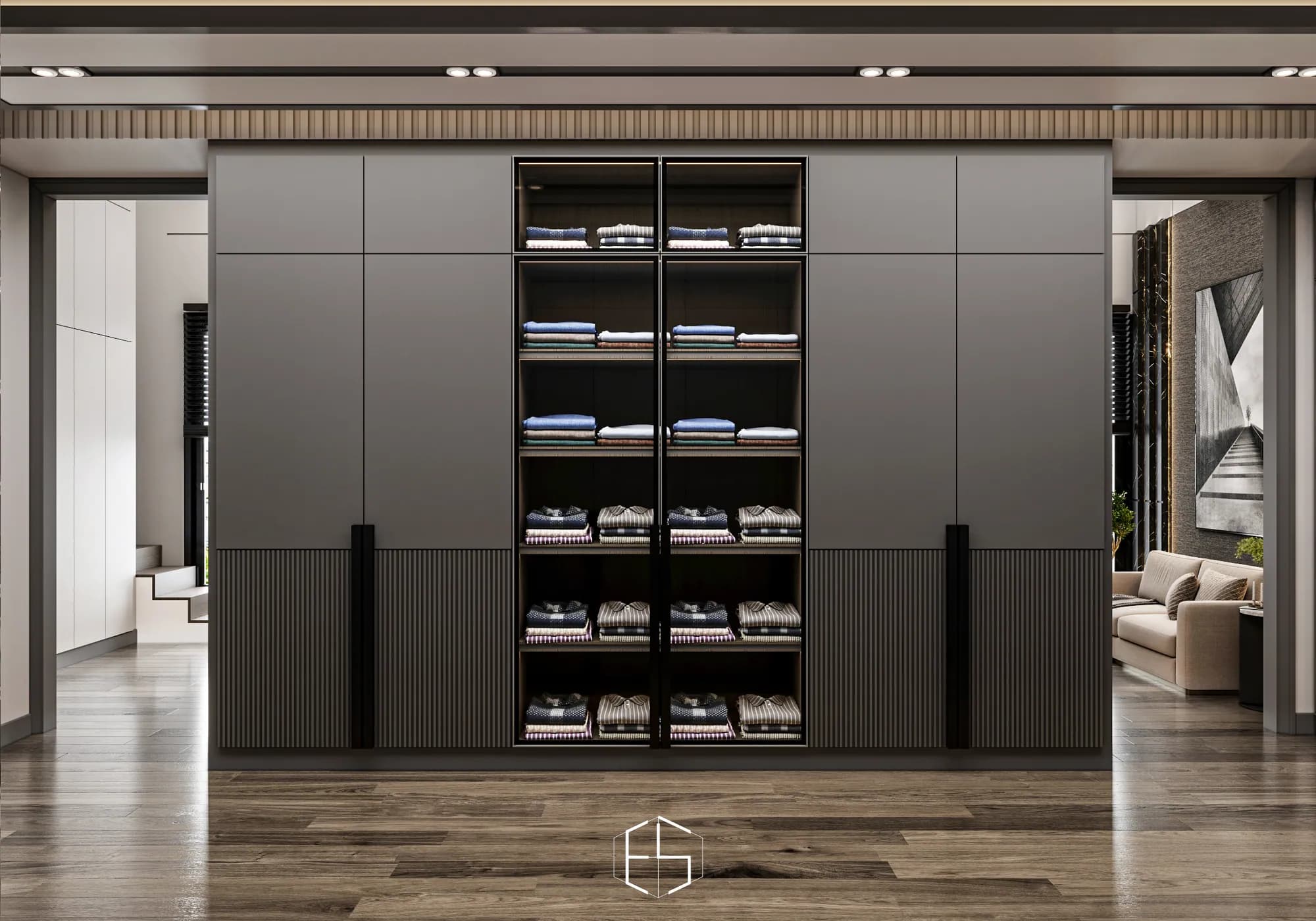 Quantis Signature: Central glass-front shelves for folded clothing sit between closed wardrobe banks, with passageways on both sides.
