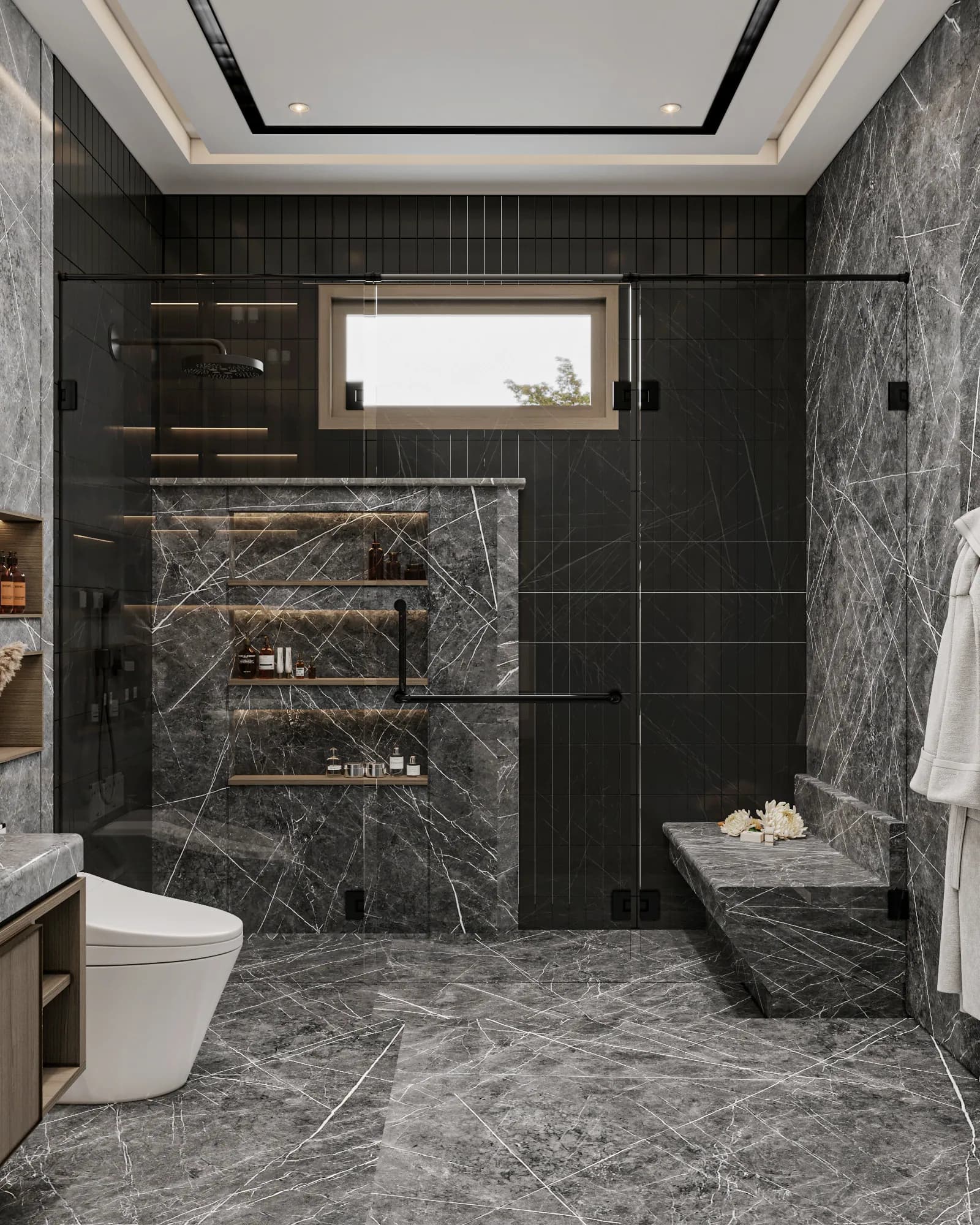 Family Residence: A glass shower screen encloses a veined bench and three illuminated storage recesses, with a high window set into the dark tiled wall.