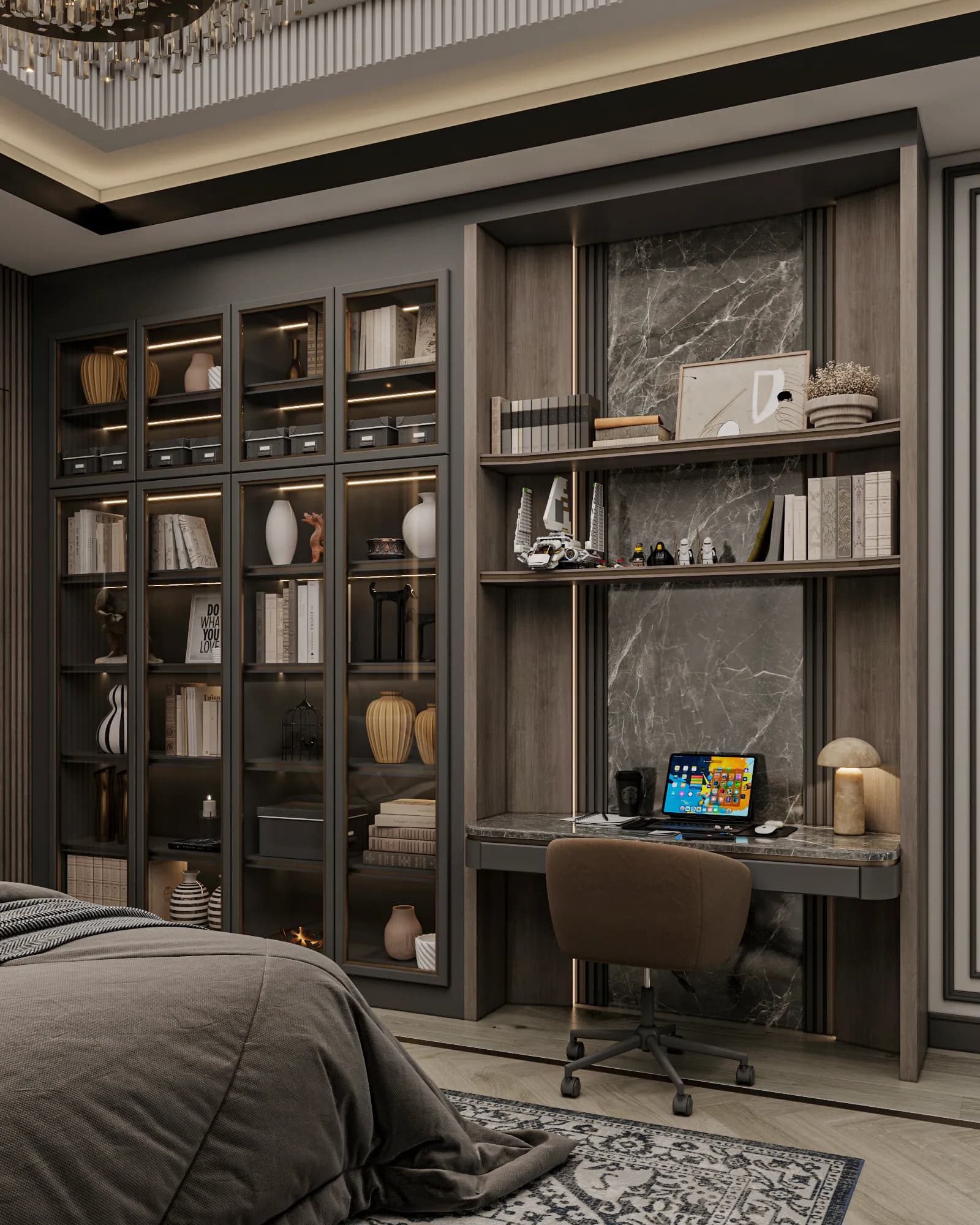 Family Residence: A recessed study desk with a laptop sits beneath open display shelves, adjoining illuminated glass-front book and collection cabinets.