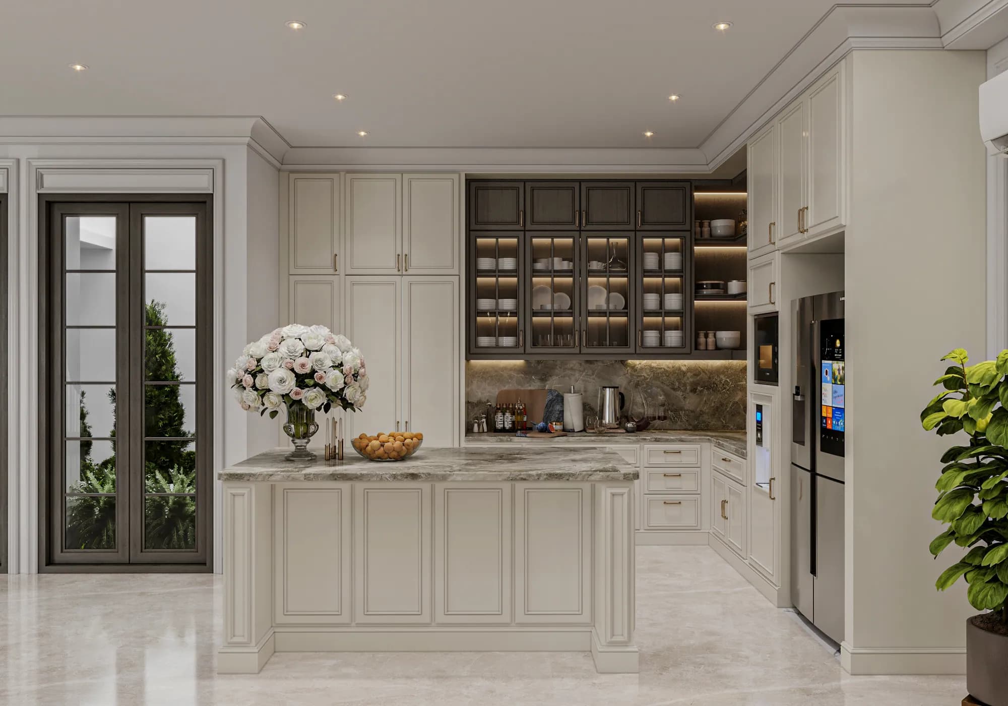 Family Residence: The kitchen pairs a pale panelled island with illuminated glass-front dish cabinets, veined work surfaces and tall appliance storage.