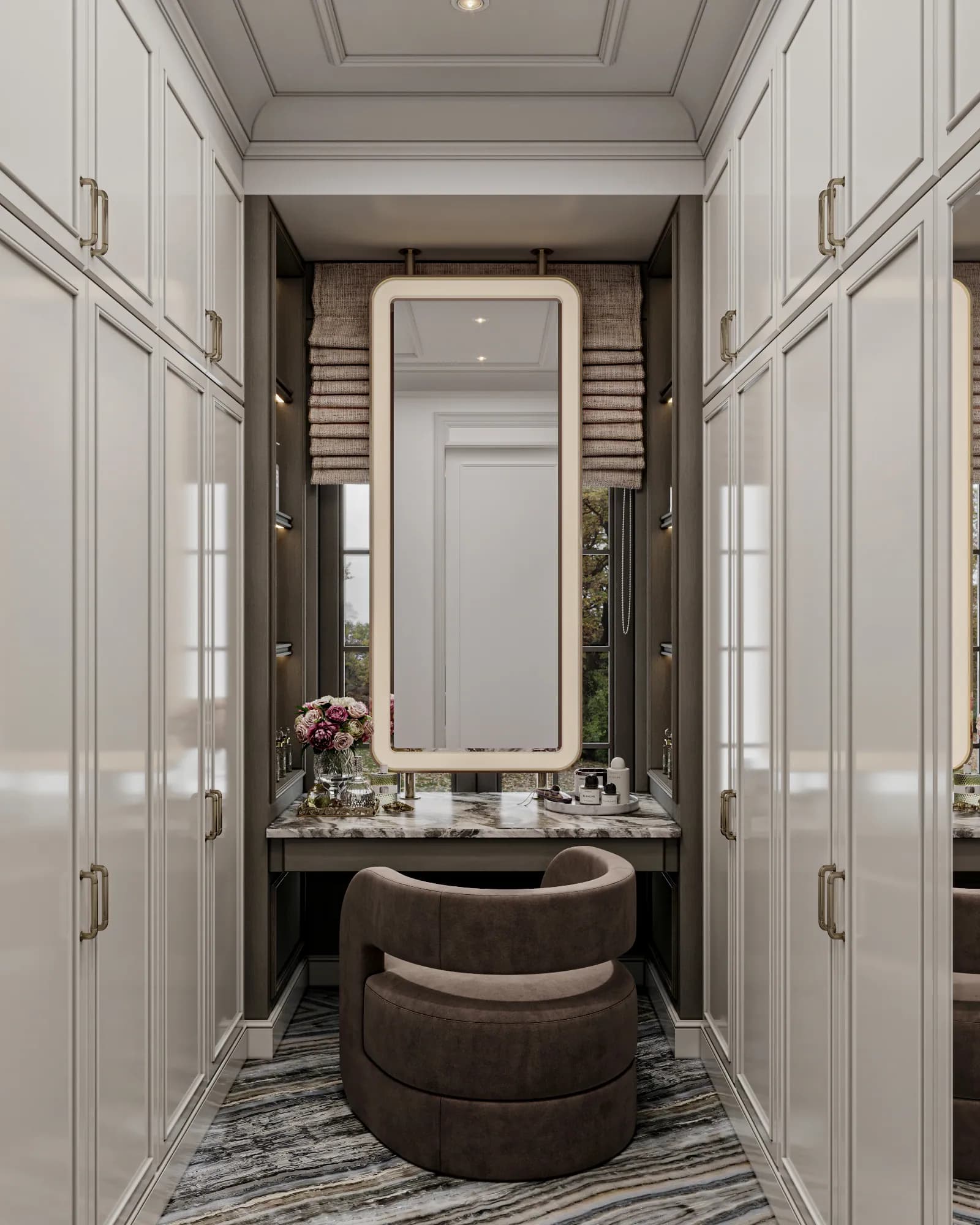 Family Residence: Full-height wardrobes flank a dressing table with a suspended rectangular mirror and curved upholstered chair in front of the window.