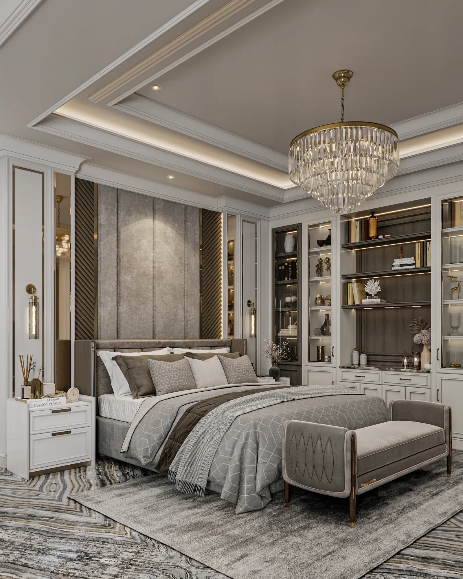 Family Residence: A padded bench sits at the foot of the bed, alongside layered grey bedding and a headboard wall combining soft panels, mirrors and diagonal grooves.