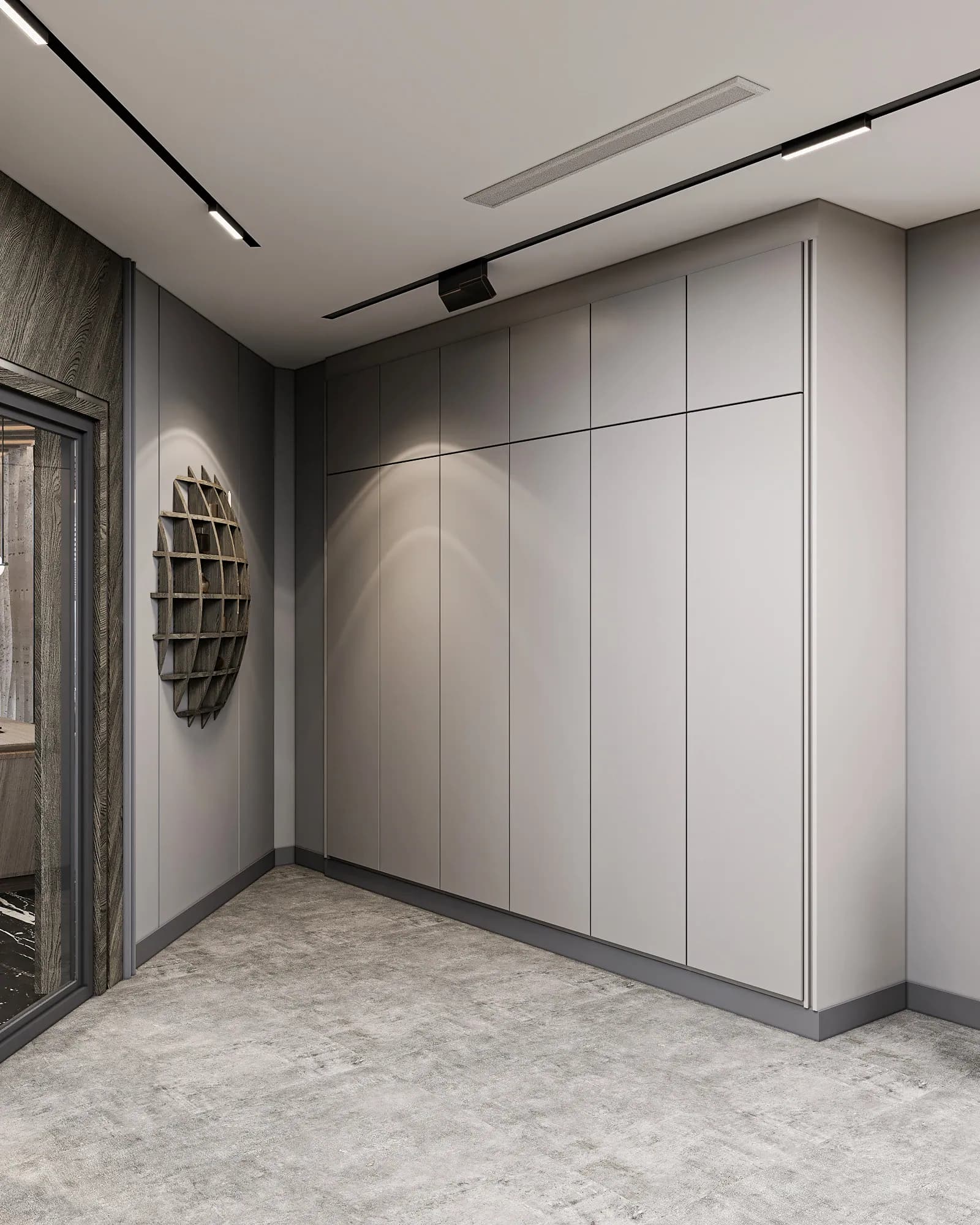 Miers Showroom: Full-height grey panels and a circular lattice wall accent define a corner beneath linear track lighting.